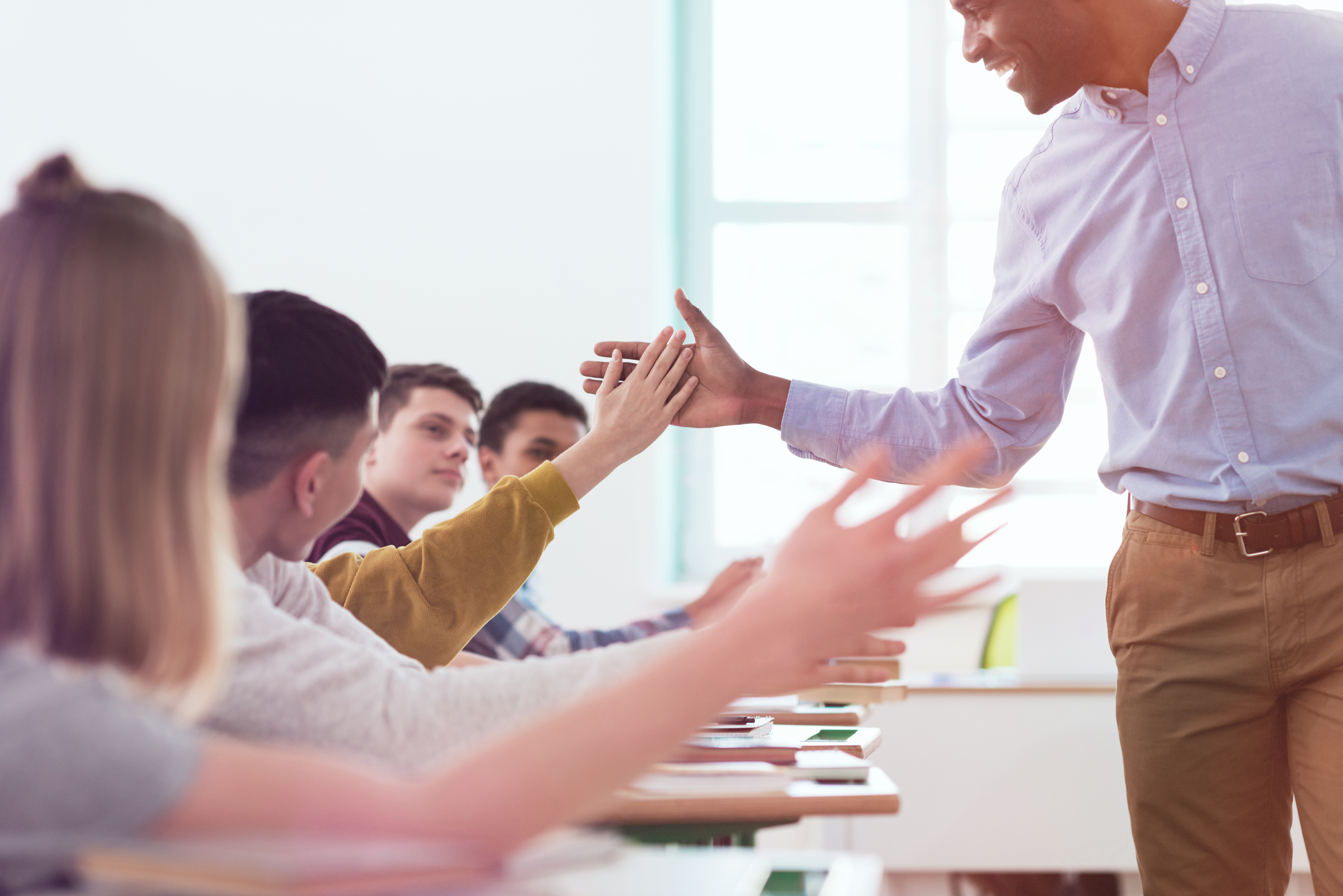 cropped-image-of-african-american-taking-high-five-2024-11-18-13-48-16-utc_edit (2)